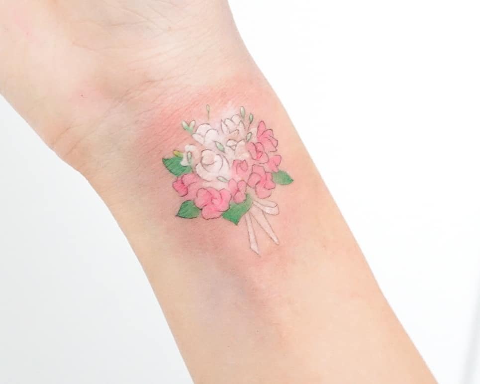 apple blossom tattoo wrist